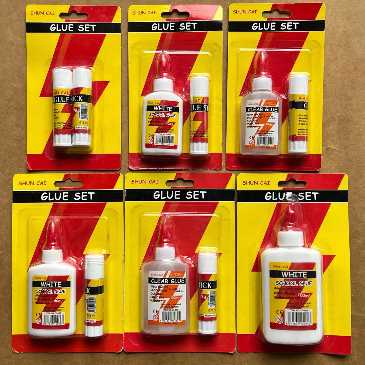 white glue and glue sticks in set