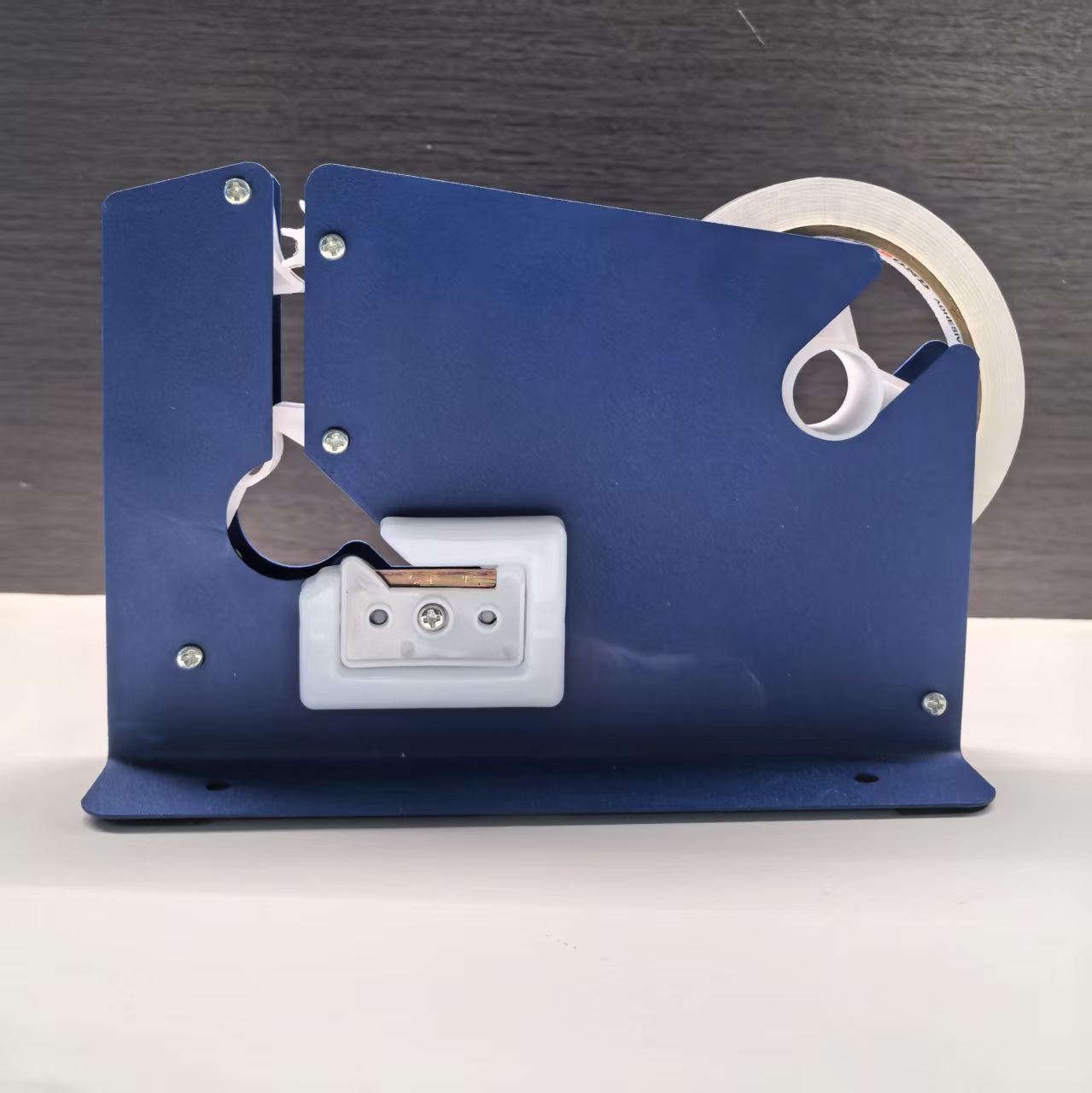 Tape dispenser bag sealer